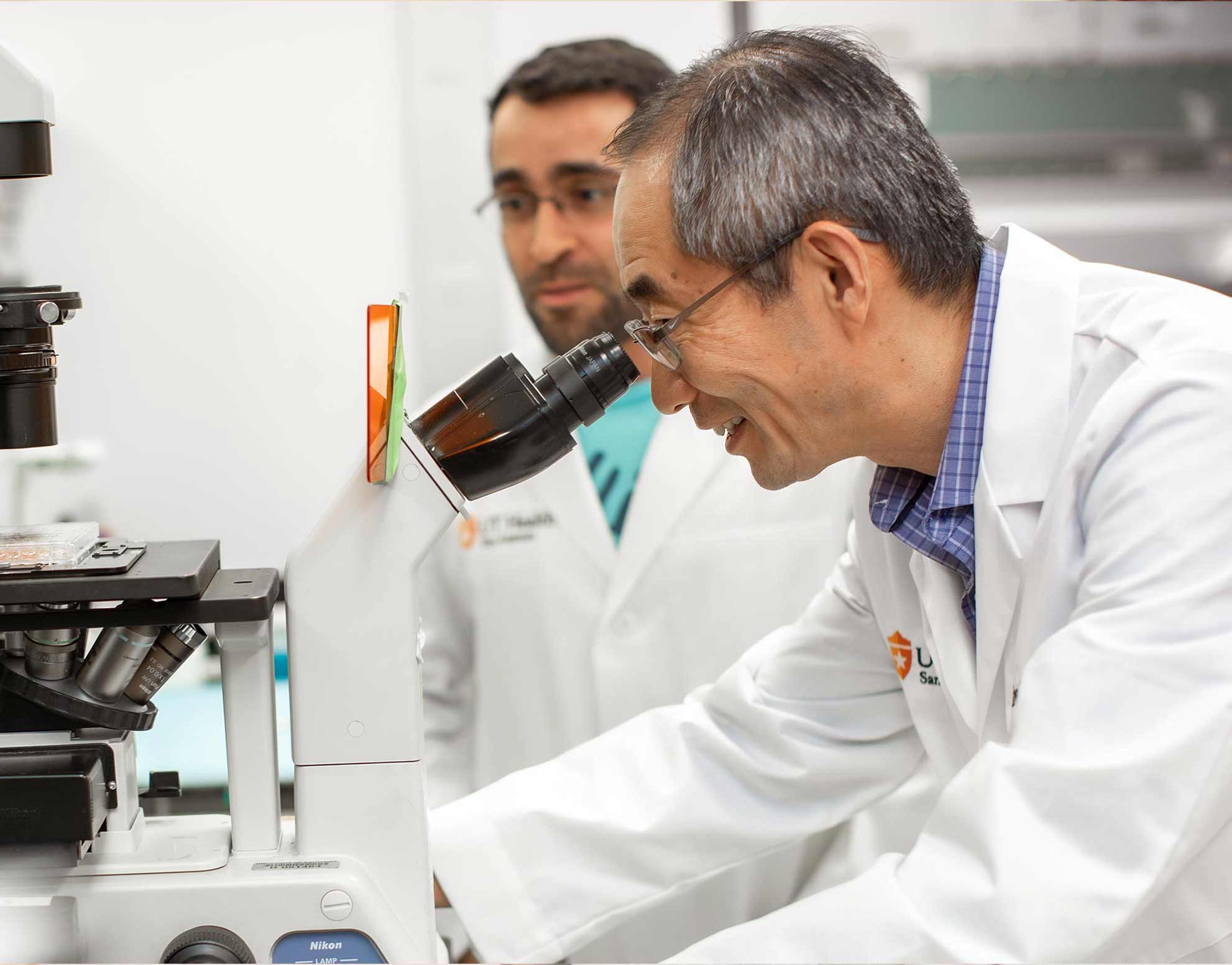 researcher in a lab testing for the blood cancer program