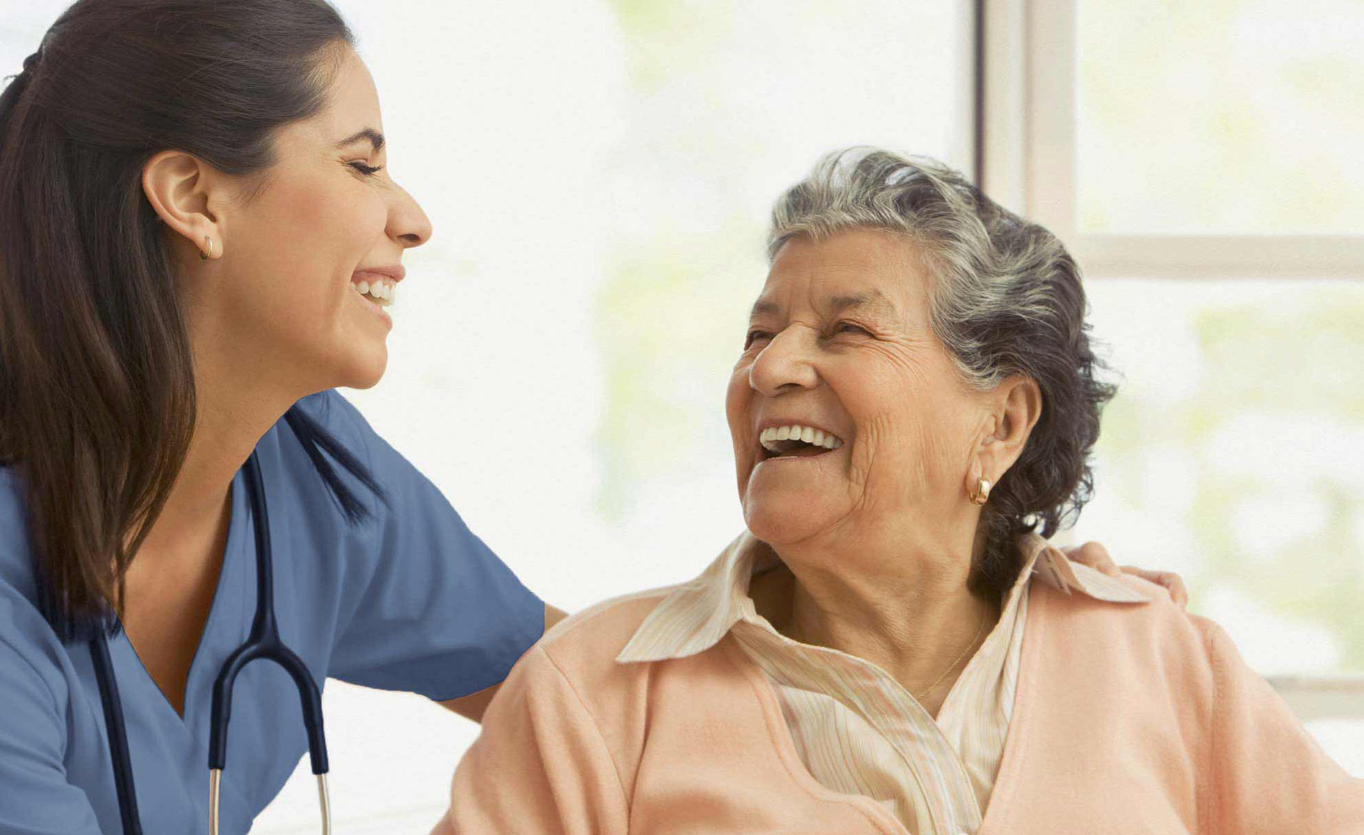 Nurse looking at patient 