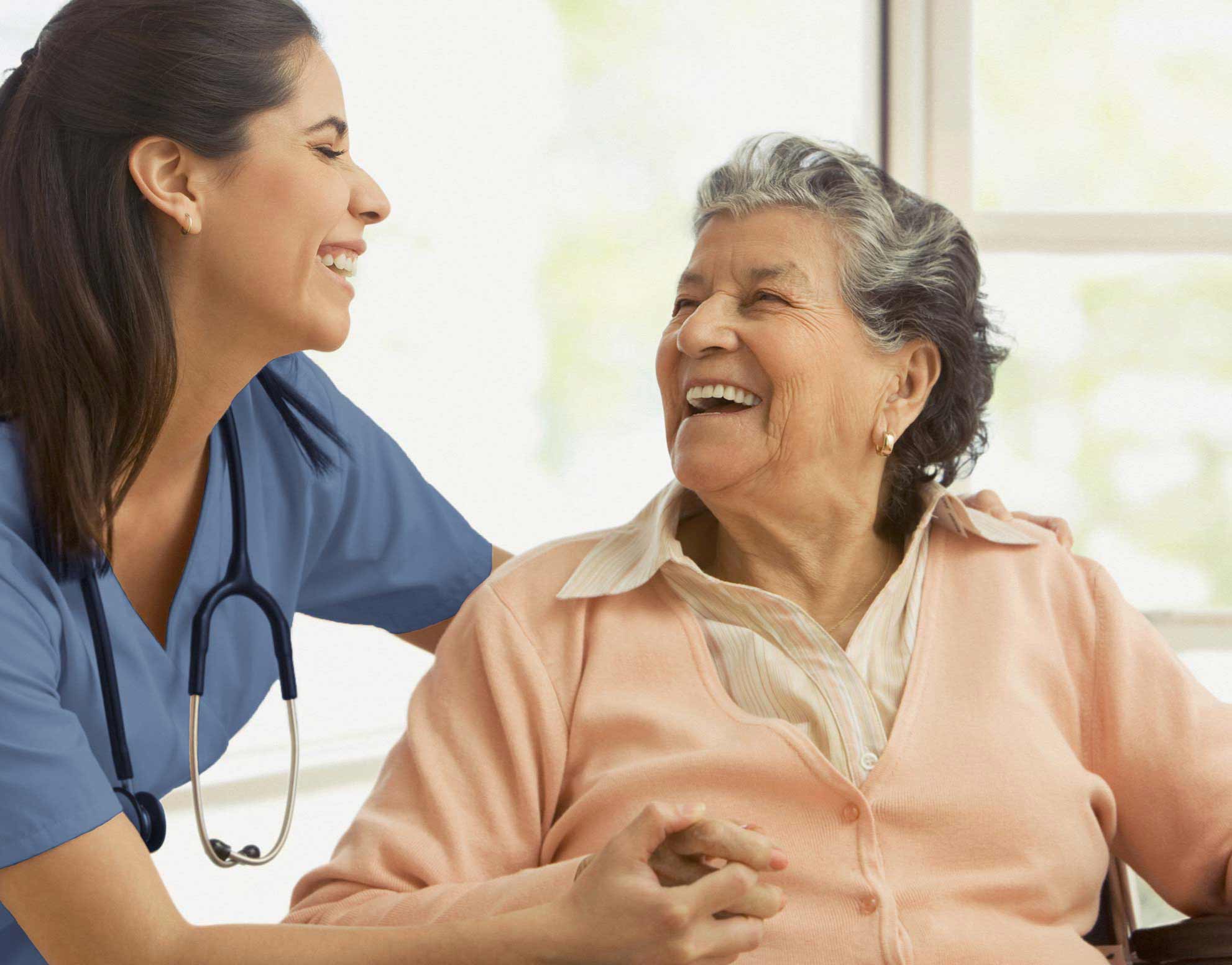 Nurse looking at patient 