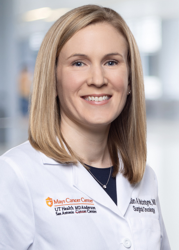 A headshot of Dr. McIntyre in her white coat