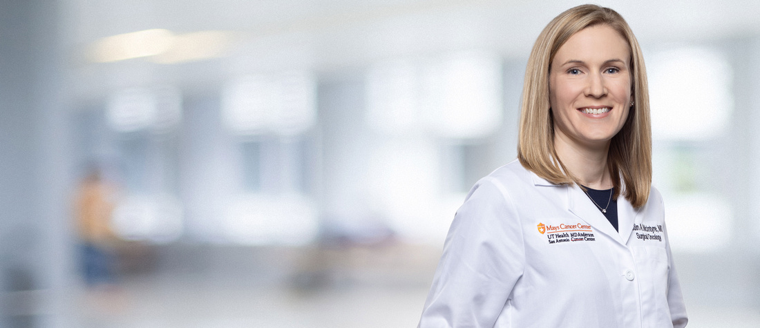 A headshot of Dr. McIntyre in her white coat