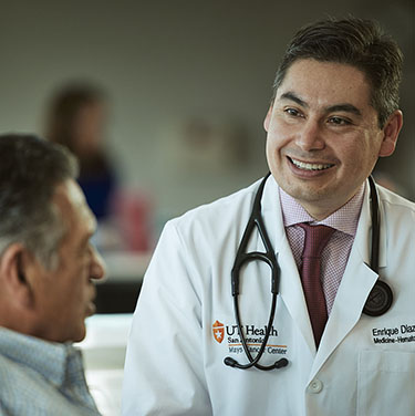 Dr. Diaz talking to a patient