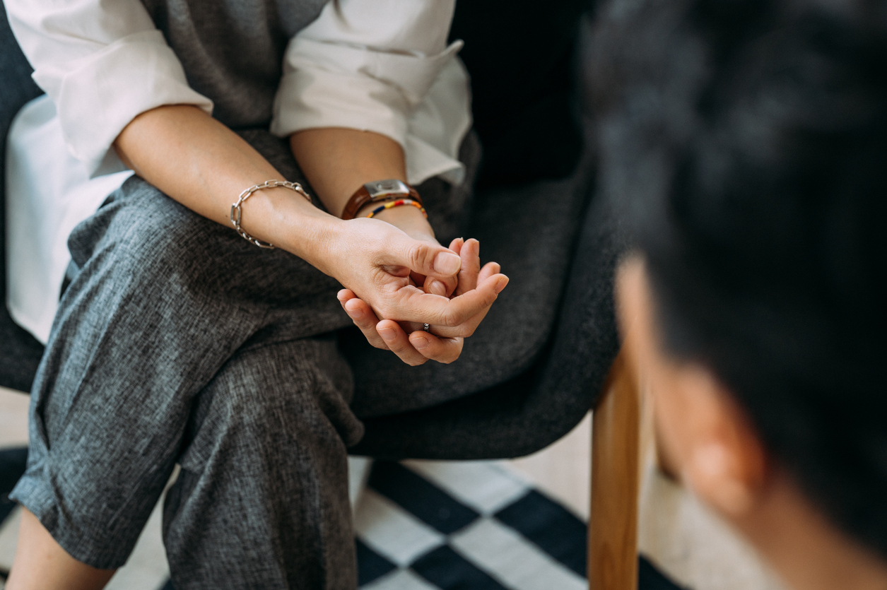 A close-up photo of a young patient's hands