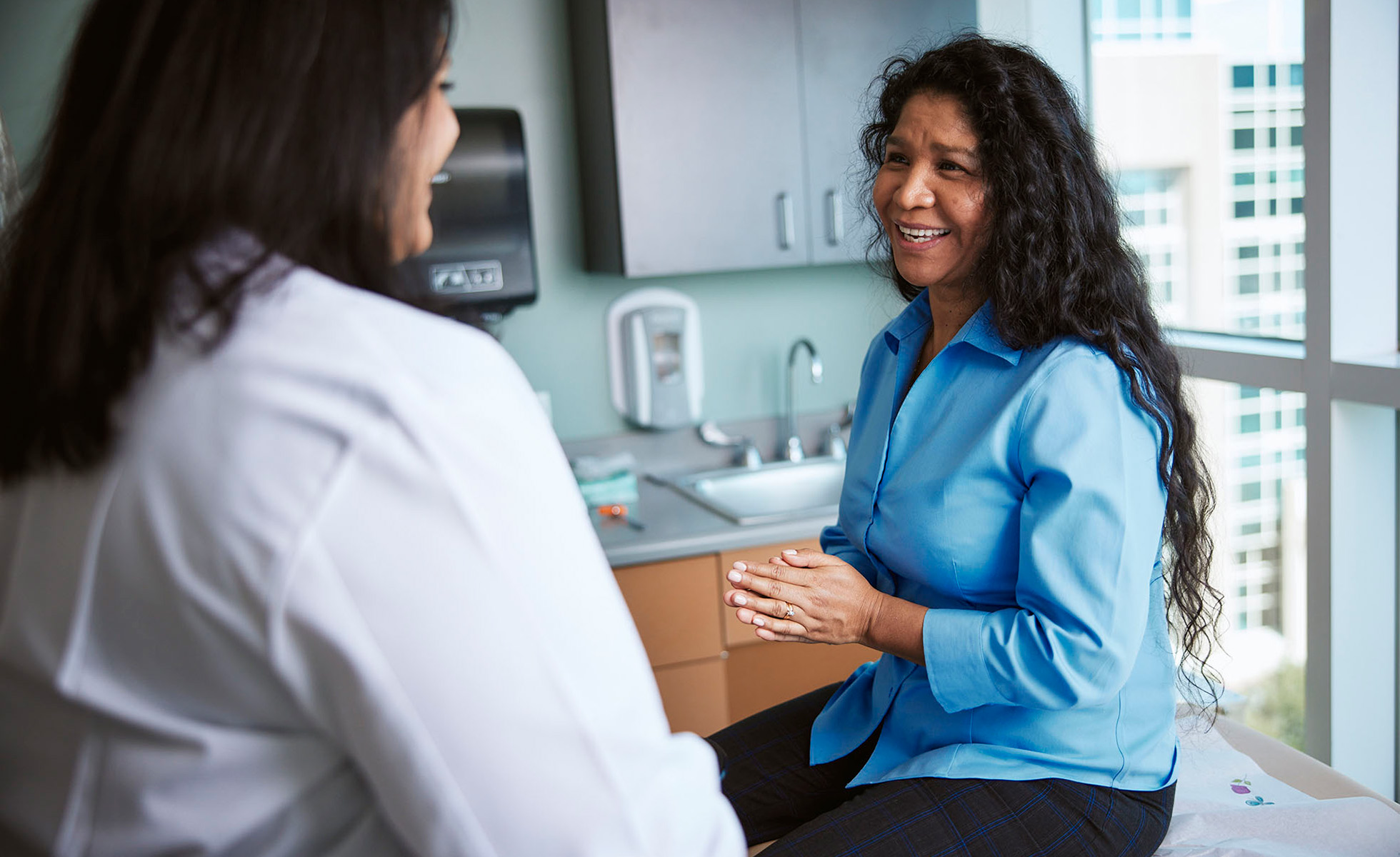 Dr. Arora talking to a patient