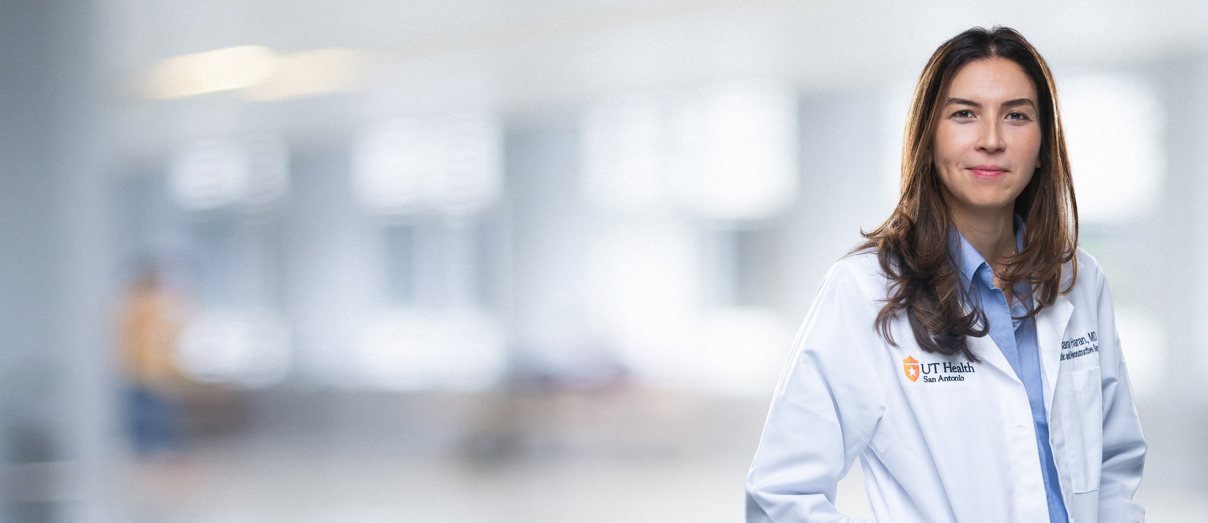 Dr. Haran in her white coat