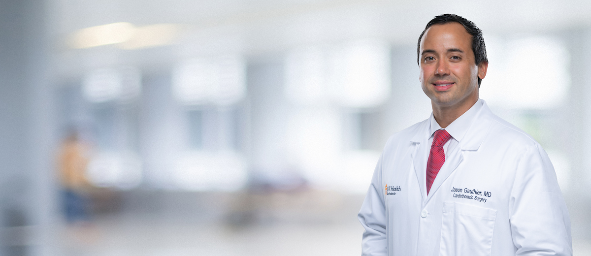 Dr. Gauthier in his white coat