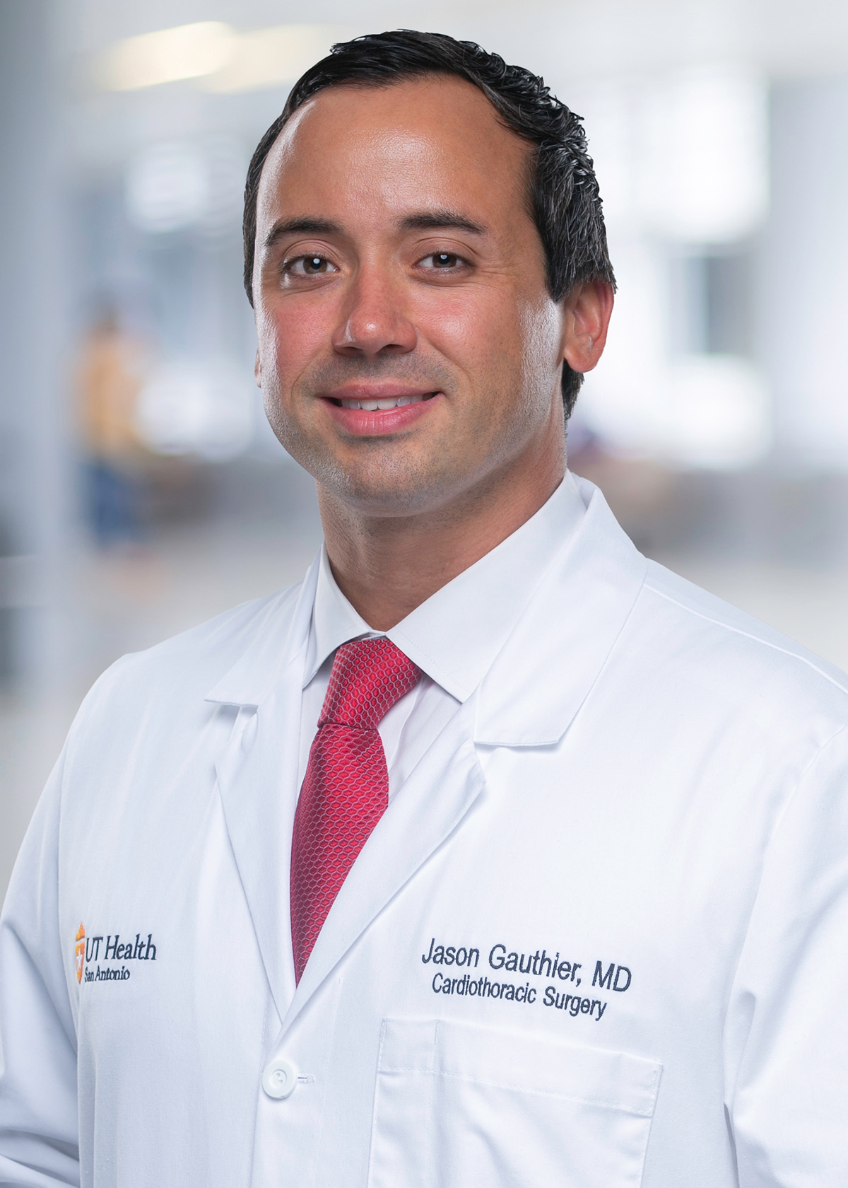 Dr. Gauthier in his white coat