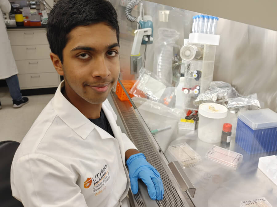 Photo of Arhan Rao, 17, in Research Lab at UT Health San Antonio