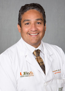 a headshot of Olveen Carrasquillo, MD