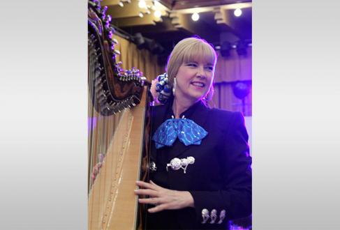 patient playing the harp