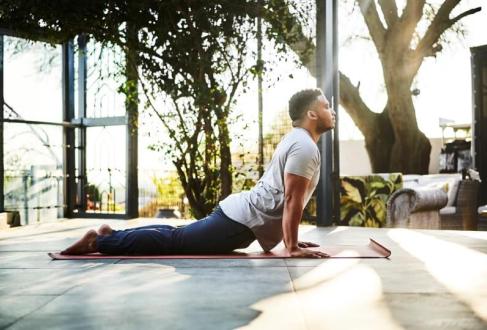 Photo of man doing yoga